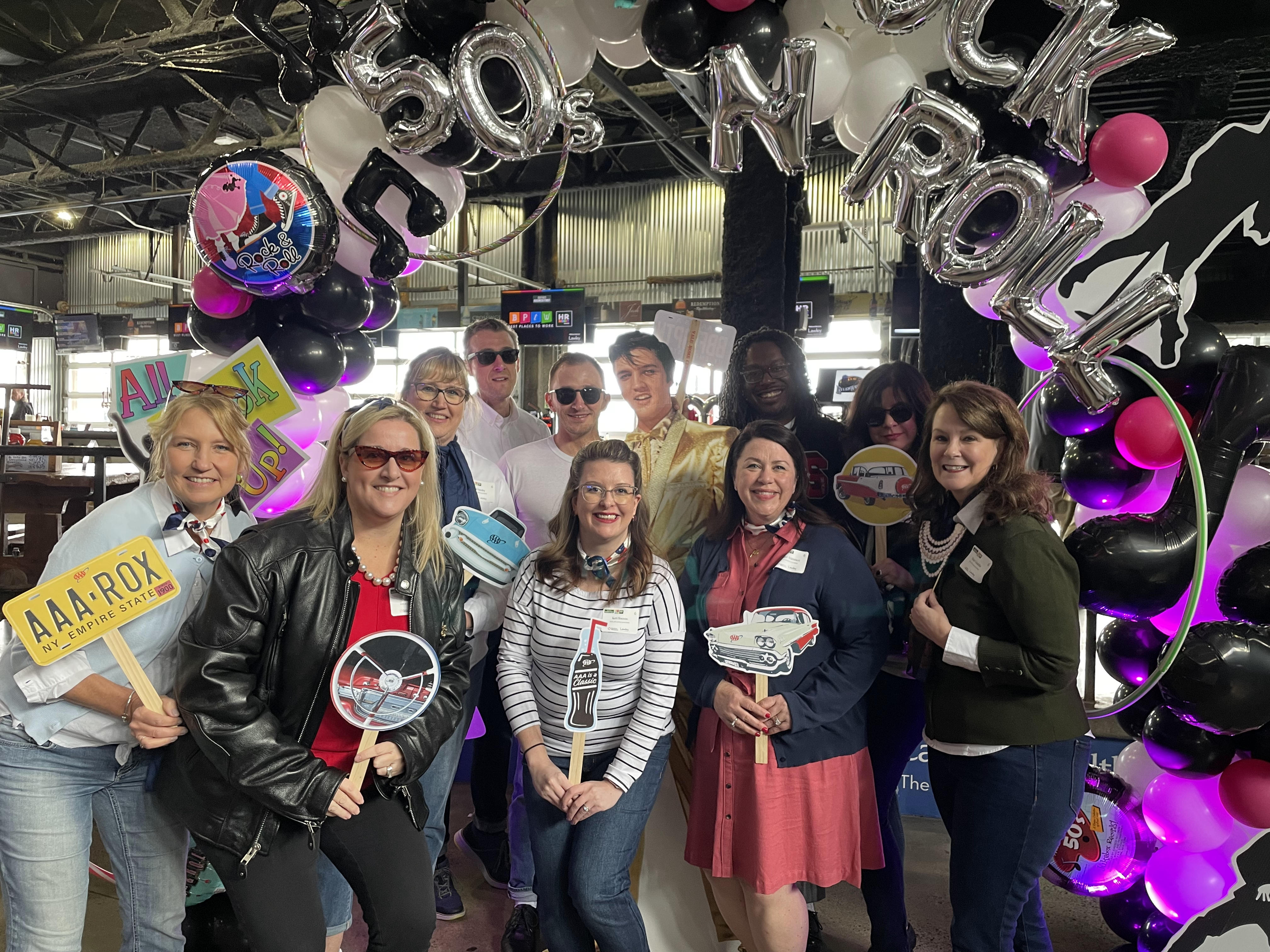 Associates from AAA Western and Central New York pose for a group photo after winning silver at Buffalo Business First's Best Places to Work contest.