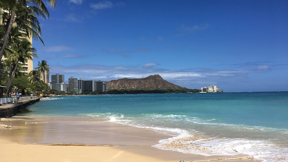 Waikiki Beach and Diamond Head Mountain Photo courtesy of Hawaii Tourism