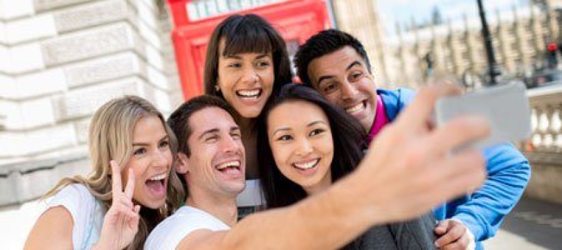 Group of travelers posing for a photo